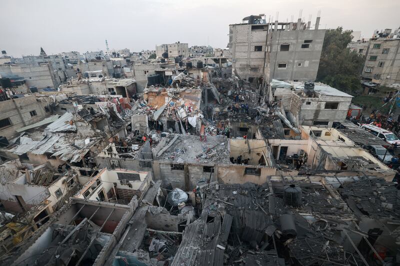 Palestinians checking the destruction following Israeli bombardment in Rafah in the southern Gaza Strip on Tuesday. Photograph: Mohammed Abed/AFP via Getty