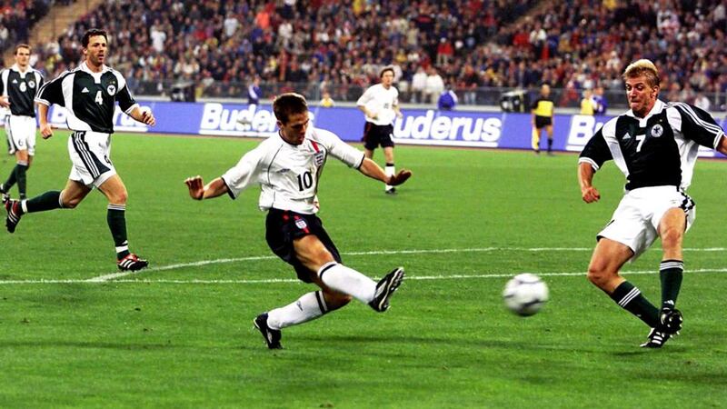 England's Michael Owen beating Marko Rehmer (right) to score his hat-trick and England's fourth goal against Germany during the Fifa World Cup  Qualifiers. Photograph: PA