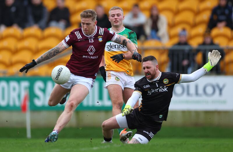 Westmeath’s Luke Loughlin and goalkeeper Ian Duffy of Offaly. Photograph: James Crombie/Inpho