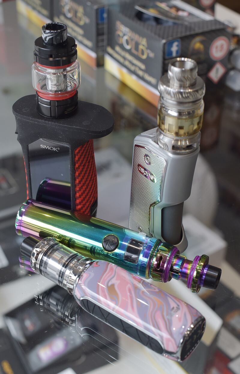 Vaping products displayed in a vape shop. Though not as harmful as cigarettes, vaping still involves nicotine. Photograph: Nicholas T Ansell/PA