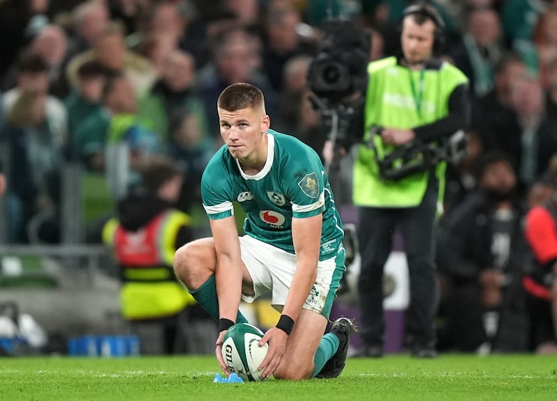 Ireland's Sam Prendergast converts a try. Photograph: Niall Carson/PA Wire