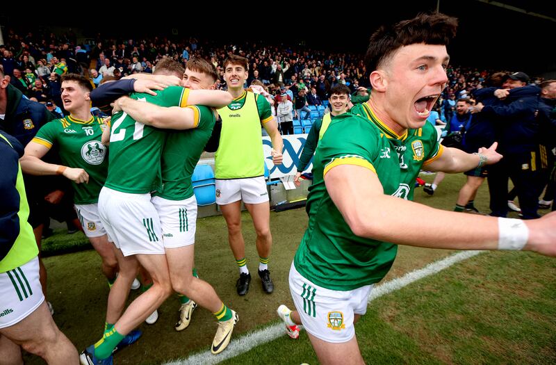 Meath’s Cian McBride, Seán Rafferty and Keith Curtis celebrating near the end of the game  against Dublin. Photograph: Ryan Byrne/Inpho