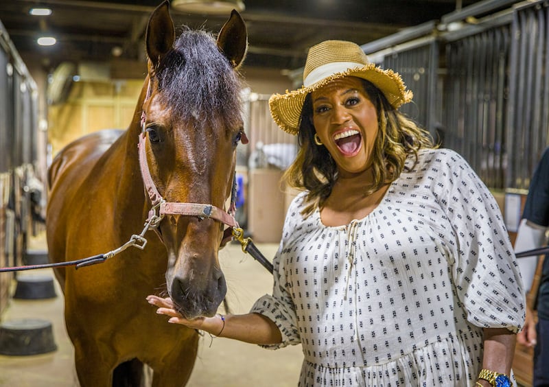 Alison Hammond's Florida Unpacked: Hammond feeding a horse at Medieval Times. Photograph: BBC/Rock Oyster Media Productions Ltd