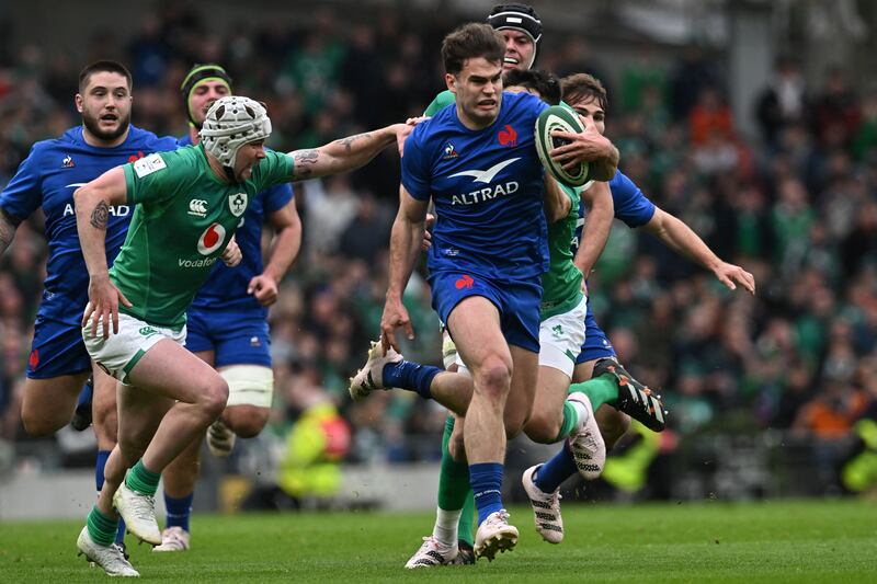 Damian Penaud touches the ball sparingly in France's attack, but when he does, France offer him good attacking opportunities. Photograph: Paul Ellis/AFP via Getty Images 