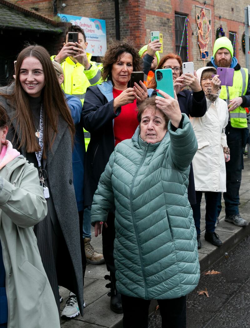 Members of the public during the funeral procession in Dublin. Photograph: Collins
