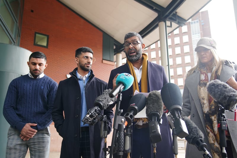 Mohammed Ramzan (second right), who was accused of trafficking by Eleanor Williams, with Nicola Holt (right), outside Preston Crown Court on Tuesday. Photograph: PA