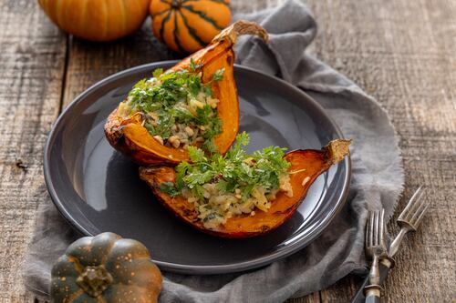Roasted pumpkin stuffed with orzo and blue cheese