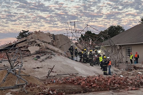 South Africa building collapse: Rescuers make contact with 11 survivors trapped in rubble