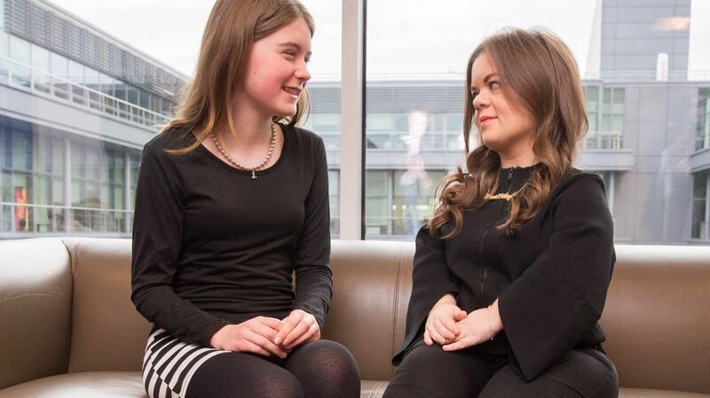 Niamh Scanlon, EU Digital Girl of the Year 2015 (left),  and Sinead Burke, teacher, broadcaster and fashion blogger, on the sidelines at Accenture’s International Women’s Day  2016 event at the Convention Centre Dublin. Photograph: Naoise Culhane