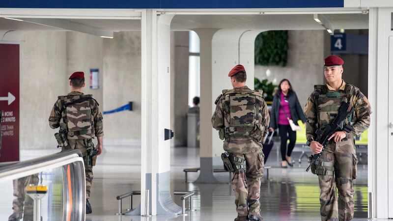 French soldiers on  patrol at Charles de Gaulle airport, from where the missing EgyptAir flight 804 took off. Photograph: AP Photo/Laurent Cipriani