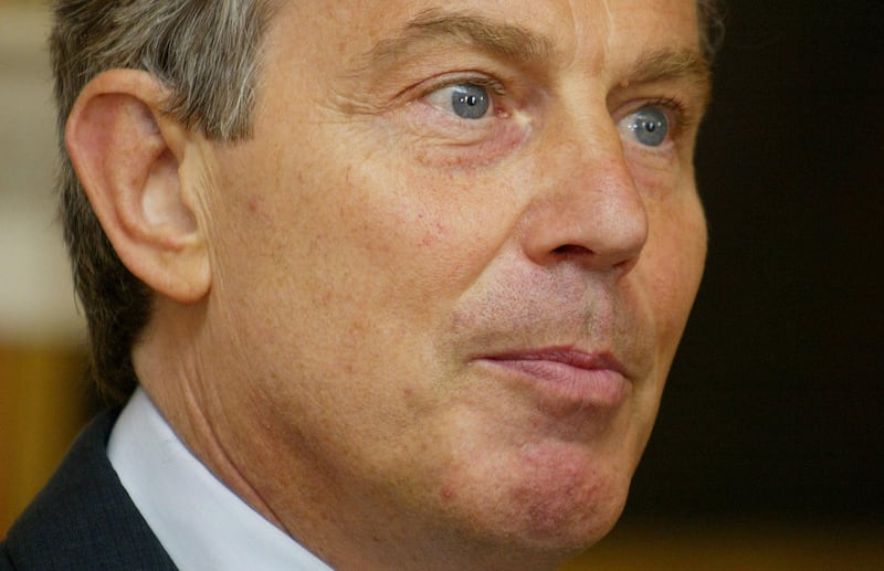 Tony Blair speaks to the media in Downing Street, London, in August 2005. Photograph: Gareth Fuller/PA