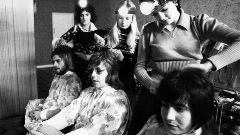 In Chatham, Kent, a hairdressing saloon provided its assistants with battery-powered “head-lamps”, similar to those used by miners due to electricity shortage in January 1974 Photograph: by WATFORD/Mirrorpix/Getty