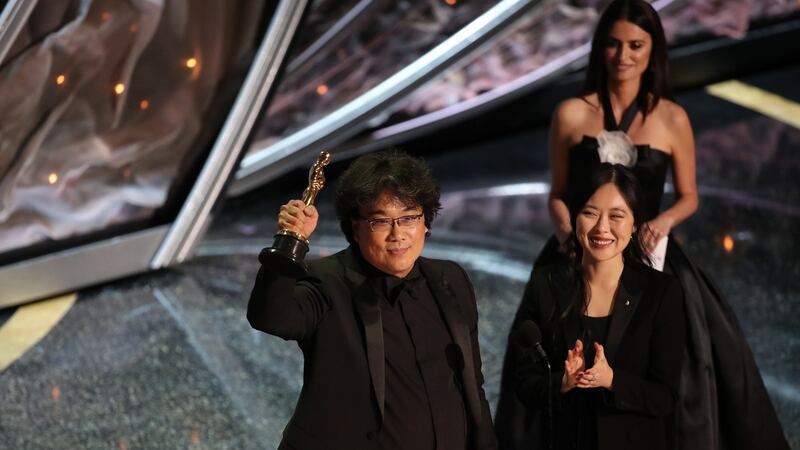 Bong Joon Ho accepts an Oscar for Parasite at the Academy Awards in Los Angeles last year. Photograph: The New York Times