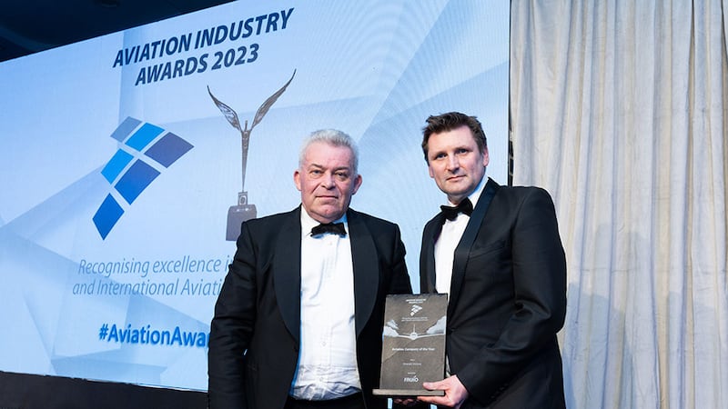 Jeremy Barnes, chief executive, Falko presents the aviation company of the year award to Keith Butler, Emerald Airlines