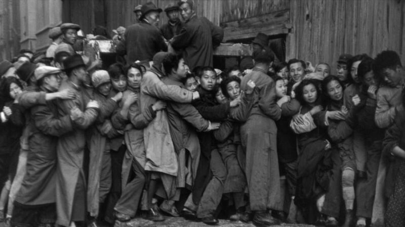 Shanghai, 1948: a crowd waiting outside a bank to buy gold during the last days of the Kuomintang. Photograph © Henri Cartier-Bresson/Magnum Photos