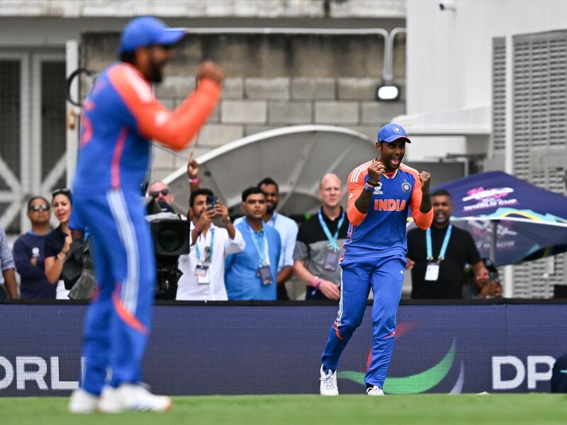 India's Suryakumar Yadav (right) celebrates after taking a catch to dismiss South Africa's Kagiso Rabada during the Twenty20 World Cup final. Photograph: Chandan Khanna/AFP via Getty Images