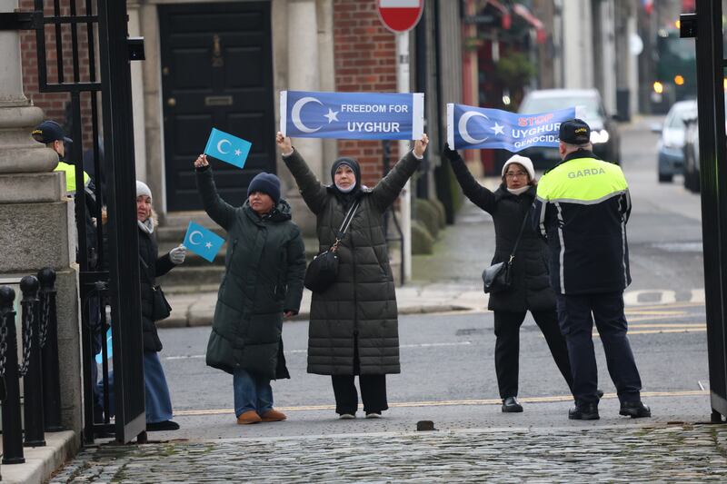 Protesters in Dublin as Taoiseach Micheál Martin met Chinese foreign minister Wang Yi  at Government Buildings. Photograph: Stephen Collins/Collins Photos
