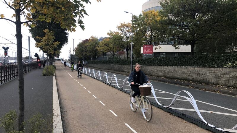 Cyclists on the Coastal Mobility Route, which was delivered by Dún Laoghaire-Rathdown County Council in less than eight weeks. Photograph: Robert Burns