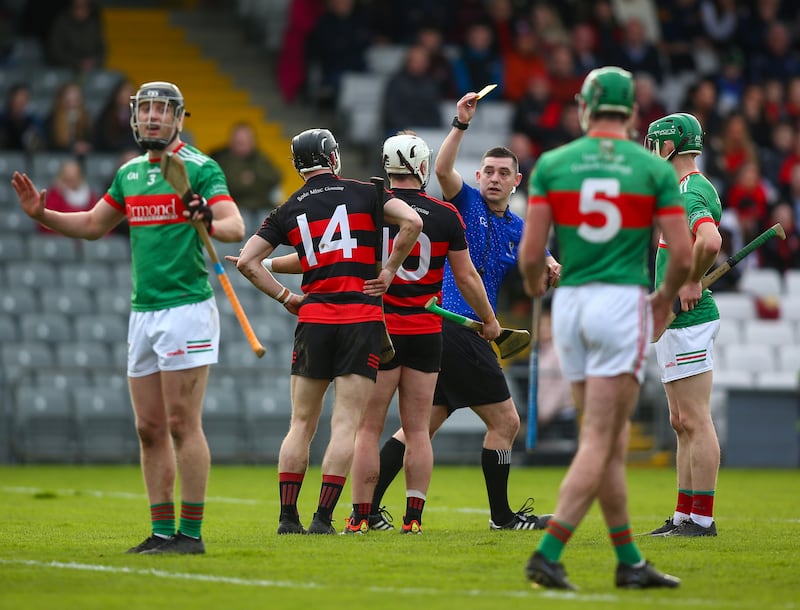 Referee Ciarán O’Regan shows Ballygunner’s Dessie Hutchinson a yellow card at Walsh Park. Photograph: Ken Sutton/Inpho