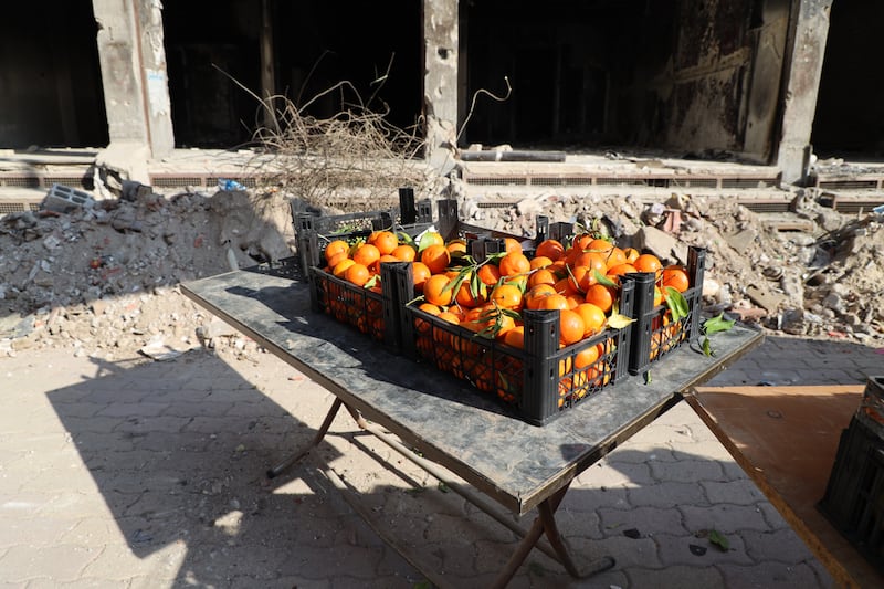 A handful of small shops now serve the estimated 3,000 people who now live in a wasteland of shattered buildings. Photograph: Hannah McCarthy