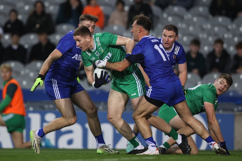 Leinster's Evan O'Carroll comes up against Alan Sweeney of Munster. Photograph: Ben Brady/Inpho