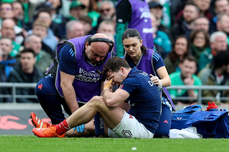 France's Antoine Dupont had to leave the field early against after suffering a ruptured cruciate ligament. Photograph: Ben Brady/Inpho