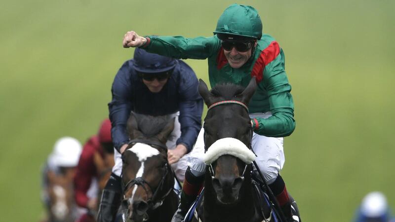 Pat Smullen riding Harzand  celebrates winning the 2016 Epsom Derby. Photograph:  Alan Crowhurst/Getty Images