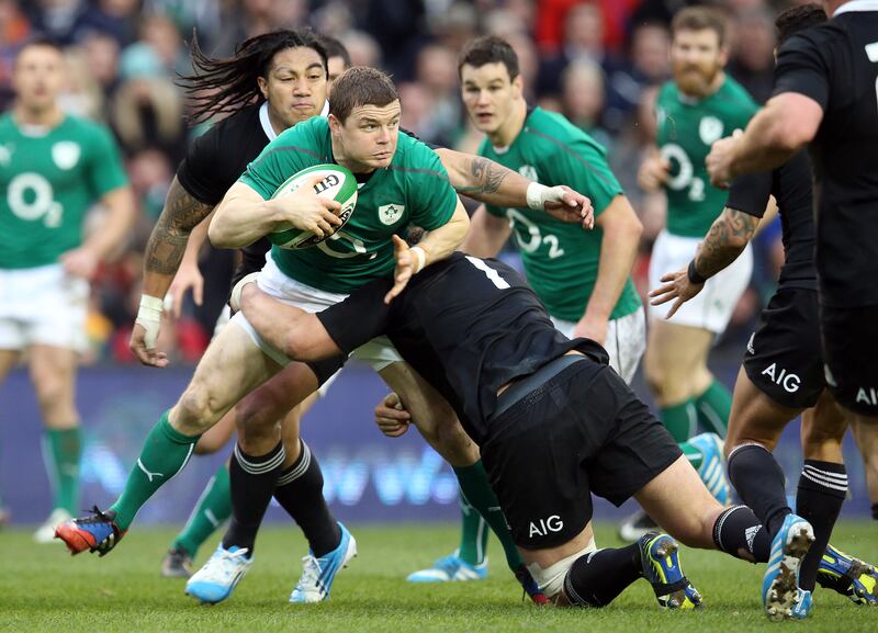 Ireland's Brian O'Driscoll is tackled by Wyatt Crockett and Ma'a Nonu of New Zealand in 2013. New Zealand tied the scores with a try in the corner and won the game with a touchline conversion. Photograph: Dan Sheridan/Inpho 