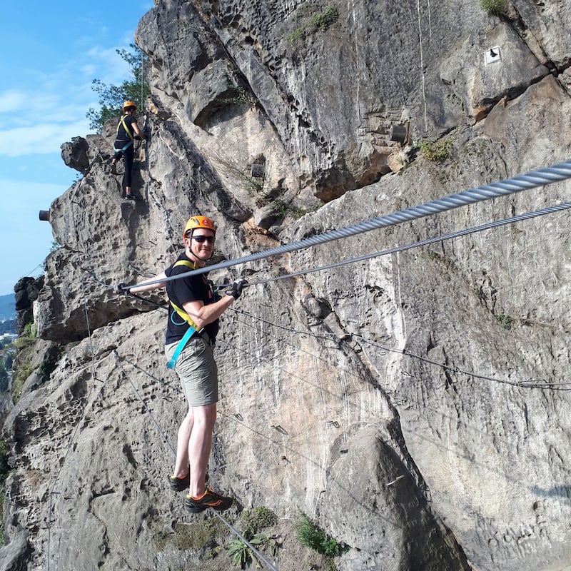 Jamie Ball enjoying a via ferrata climbing route in the Czech Republic in 2019