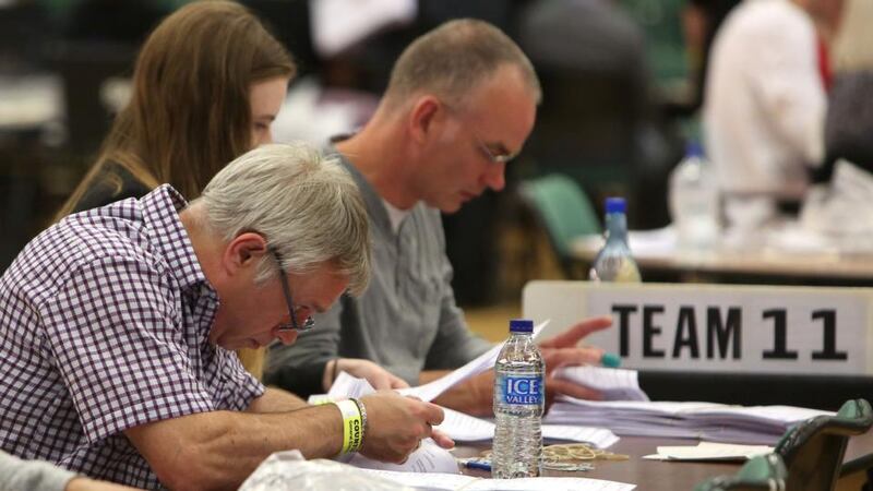 Close call: counting staff in Maidenhead, where Prime Minister Theresa May retained her seat. Photograph: Geoff Caddick/AFP/Getty