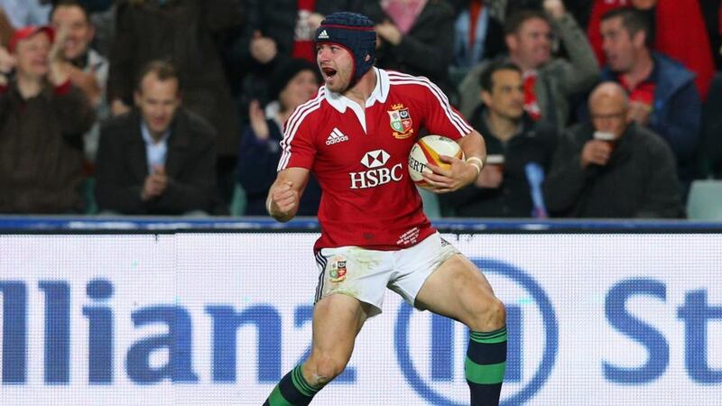 Leigh Halfpenny of the Lions celebrates scoring a try against the Waratahs at Allianz Stadium in Sydney, Australia. Photograph:  Cameron Spencer/Getty Images