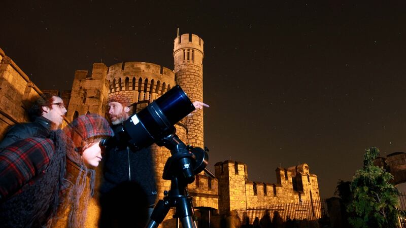 Aina Andreu from Barcelona looking at the stars during the Global star count in Orion at Blackrock Castle Observatory at an Earth Hour event. Photograph: Miki Barlok