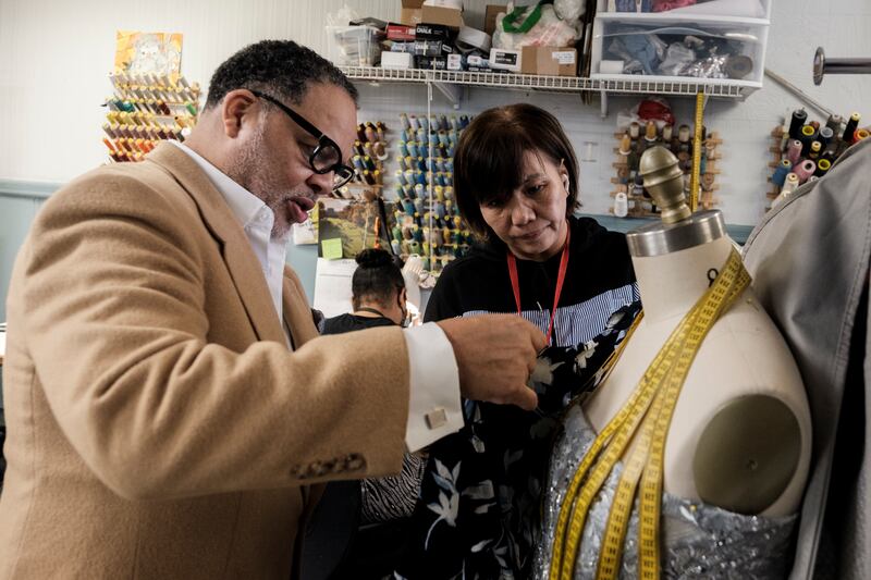 Eddie Lofton, owner of JC Lofton Tailors in Washington, says members of Congress will still be paid during a shutdown. Photograph: Michael A McCoy/New York Times
                      