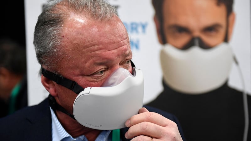 Franck Glaizal, chief executive and co-founder, demonstrates the Airxom mask for active protection from the effects of air pollution, bacteria, and viruses including Covid-19 during CES Unveiled ahead of the Consumer Electronics Show in Las Vegas. Photograph: Patrick  Fallon / AFP via Getty Images