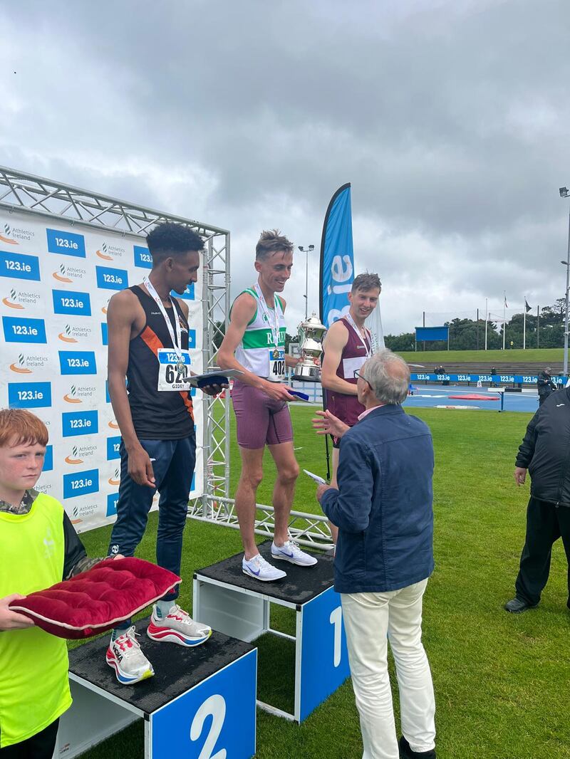 Brian Fay being presented with the Tom O’Riordan memorial cup at Santry