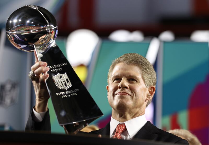 Kansas City Chiefs chairman and CEO Clark Hunt celebrating with the Vince Lombardi Trophy after defeating the Philadelphia Eagles in the Super Bowl  at State Farm Stadium in Glendale, Arizona, on February 12th, 2023