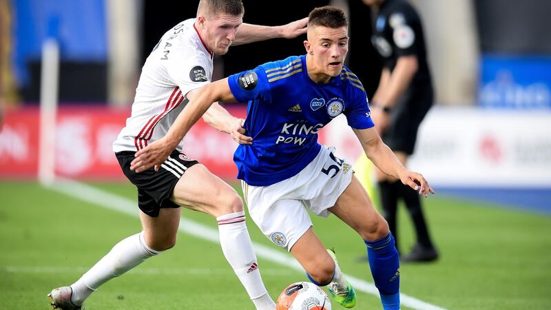 Leicester City’s Luke Thomas goes past  Sheffield’s John Lundstram  during the  Premier League game at the King Power Stadium. Photograph: Michael Regan/NMC/EPA