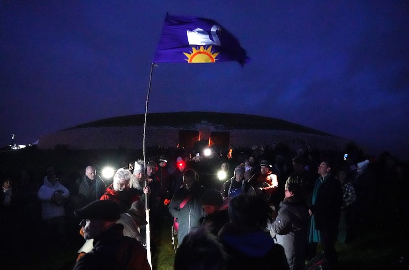 People gather for sunrise at Newgrange. Photograph: Brian Lawless/PA Wire