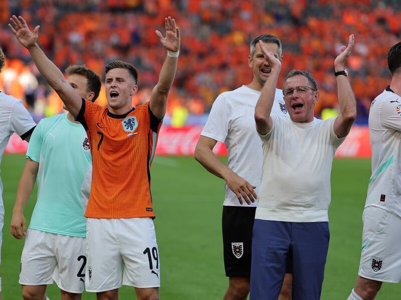 Manager Ralf Rangnick and player Christoph Baumgartner celebrate after Austria's group-stage victory over the Netherlands. Photograph: Christina Pahnke/Sampics/Getty Images)