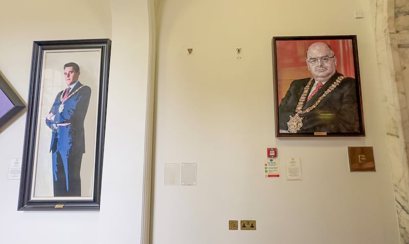 The empty space on the wall of Belfast City Hall where Niall Ó Donnghaile's Lord Mayoral portrait hung until it was removed on Thursday. Photo: Liam McBurney/PA Wire