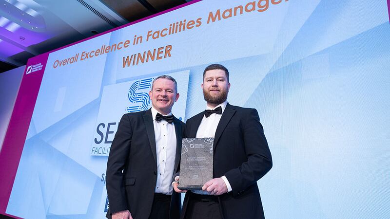 Liam Smith, sales director at Tork, an Essity brand, presents the Overall Excellence in Facilities Management award to Shane Cranny, Sensori Facilities Management