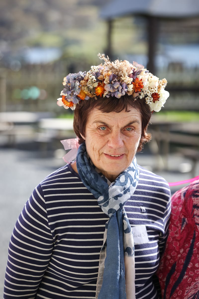 Anne Duffy wearing a flower crown at Birds of a Feather