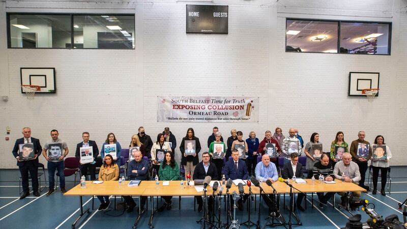 Families of those killed or injured by loyalist paramilitaries  holding images of their loved ones during a press conference at Shaftesbury Recreation Centre, Ormeau Road, Belfast, following the publication of the Police Ombudsman’s report. Photograph: Liam McBurney/PA Wire