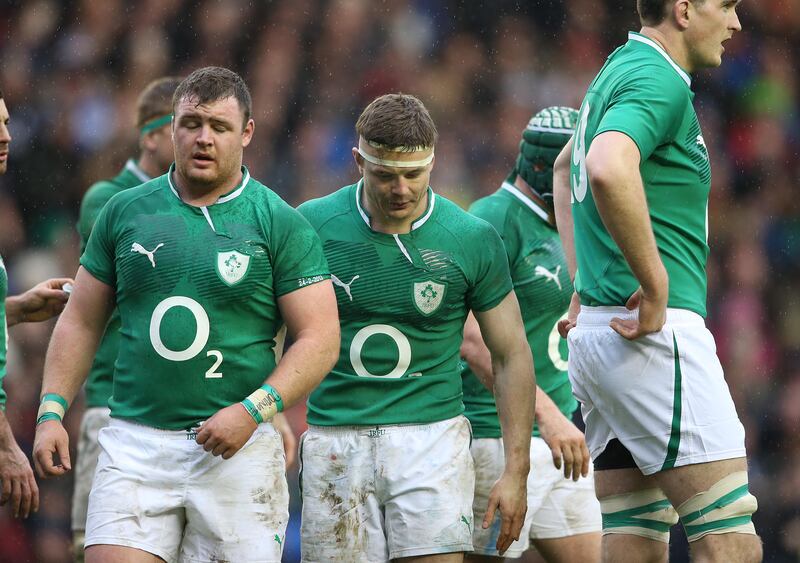 Ireland's David Kilcoyne and Brian O'Driscoll after the narrow defeat to Scotland at Murrayfield in 2013. Photograph: Billy Stickland/Inpho 