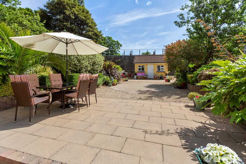 The 86ft back garden is set out in paving and gravel, with a block-built shed