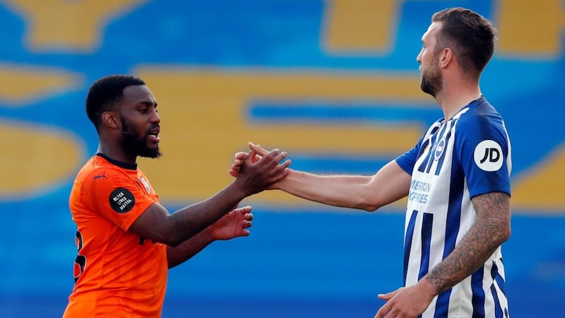 Brighton’s Shane Duffy shakes hands with  Danny Rose of Newcastle United after a recent Premier League game. Photograph: Andrew Couldridge/Pool via Getty Images