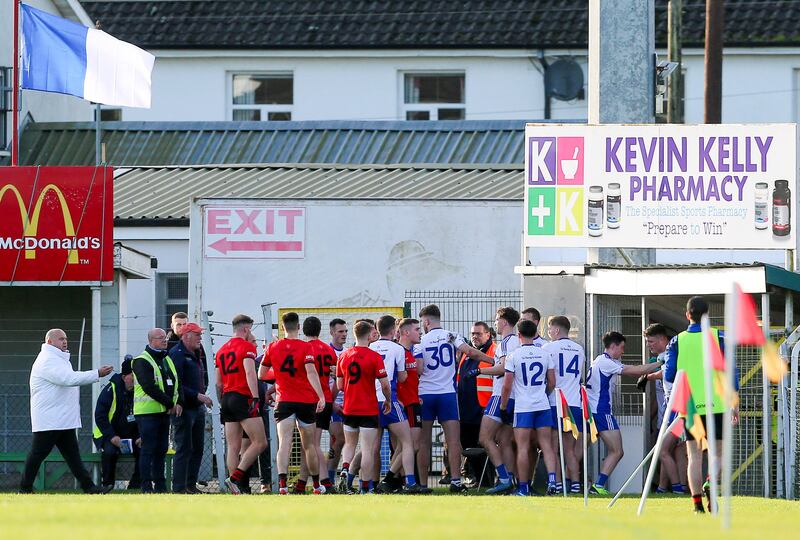 Tempers flare between both sets of players as they enter the tunnel for half time. Photograph: Ken Sutton/Inpho