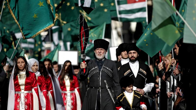 Members of a Circassian ethnic group shout slogans during a protest against the Olympic Winter Games of 2014 in front of the Russian consulate in Istanbul, Turkey. Photograph: Sedat Suna/EPA