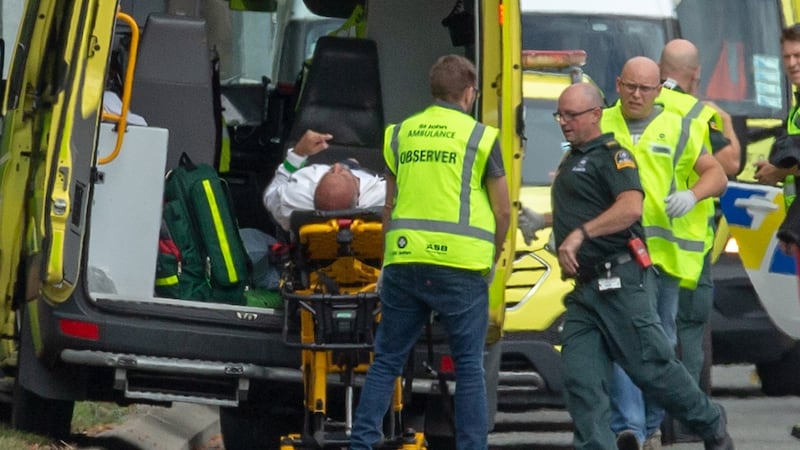 An injured person is loaded in an ambulance following a shooting   at the Masjid Al Noor mosque  in Christchurch, New Zealand. Photograph: EPA