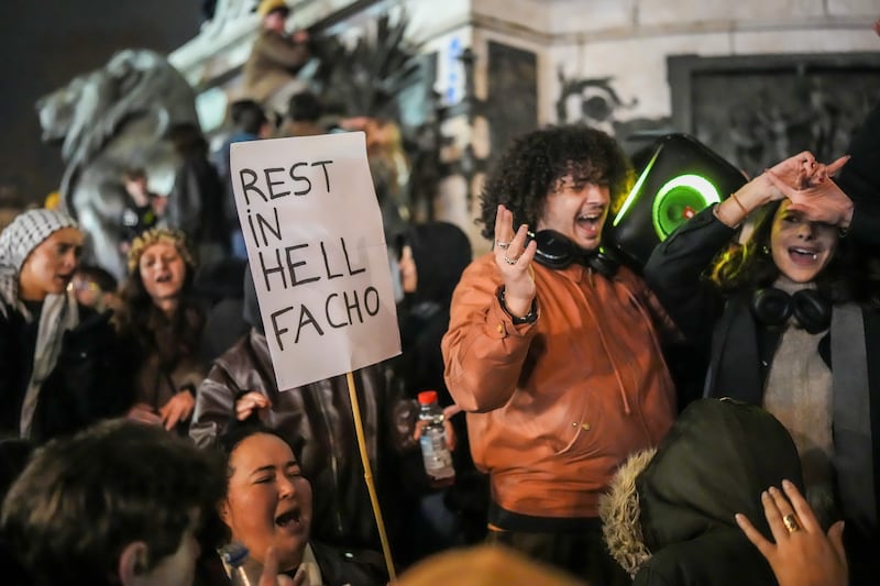 People gather at Place de la République in Paris after it was announced that far-right politician Jean Marie Le Pen had died on January 7th. Photograph: Christopher Furlong/Getty Images